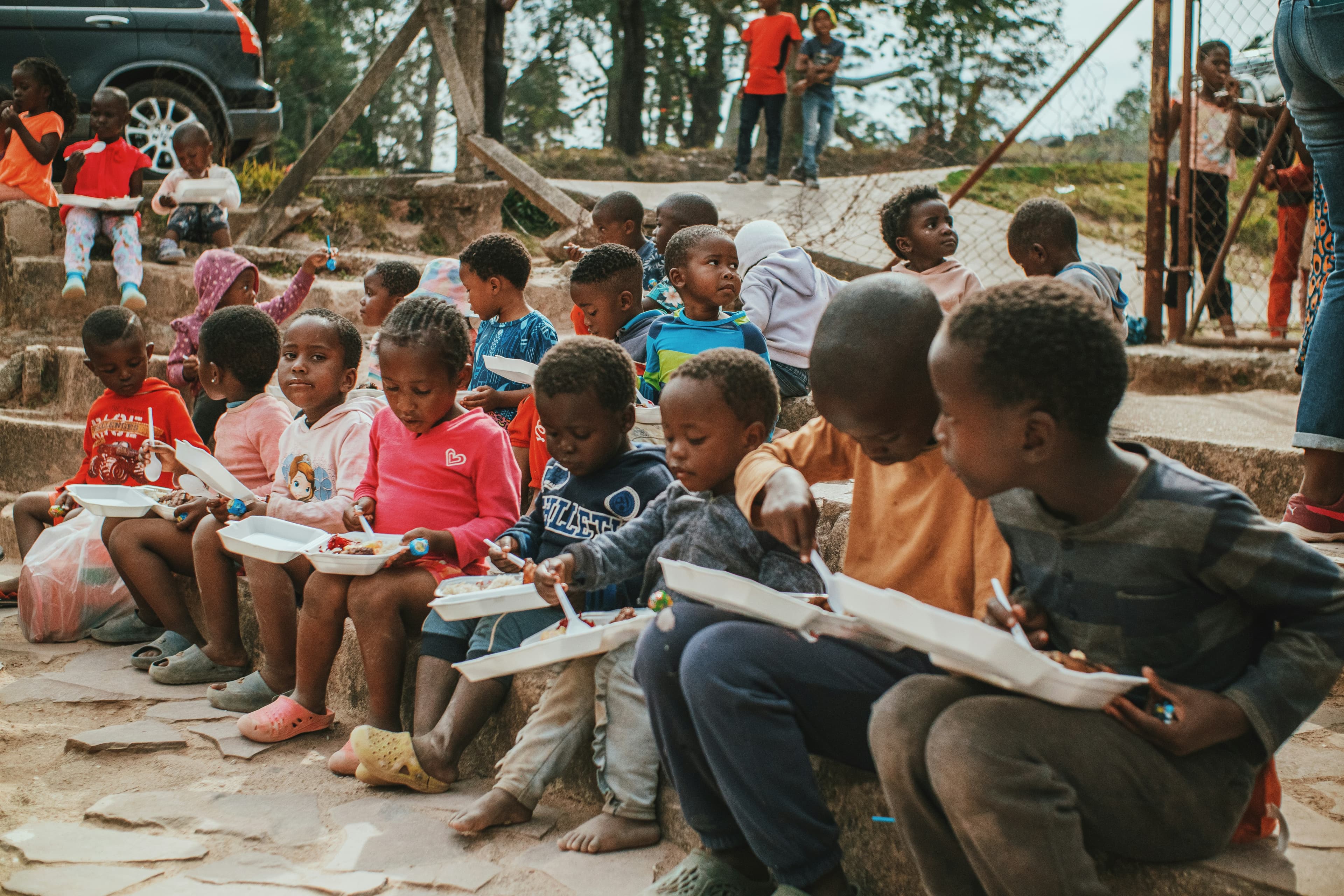 Children smiling at 4Ever Shelter Orphanage